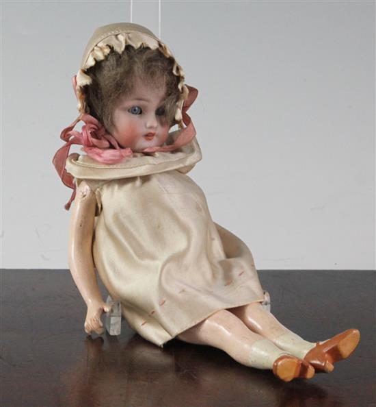 A small Simon & Halbig bisque headed doll, 24.5cm